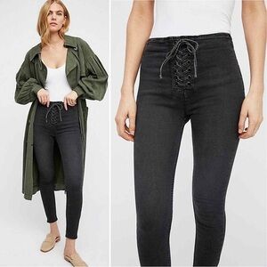 Free people high waist lace up skinny jeans in distressed black.